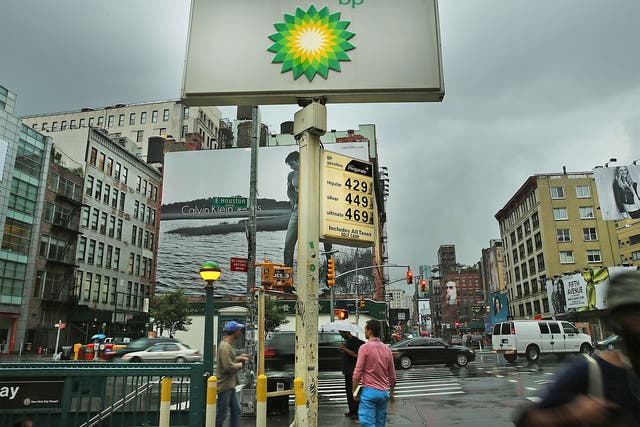 A petrol station in New York in 2014. The oil price has since dropped by more than half