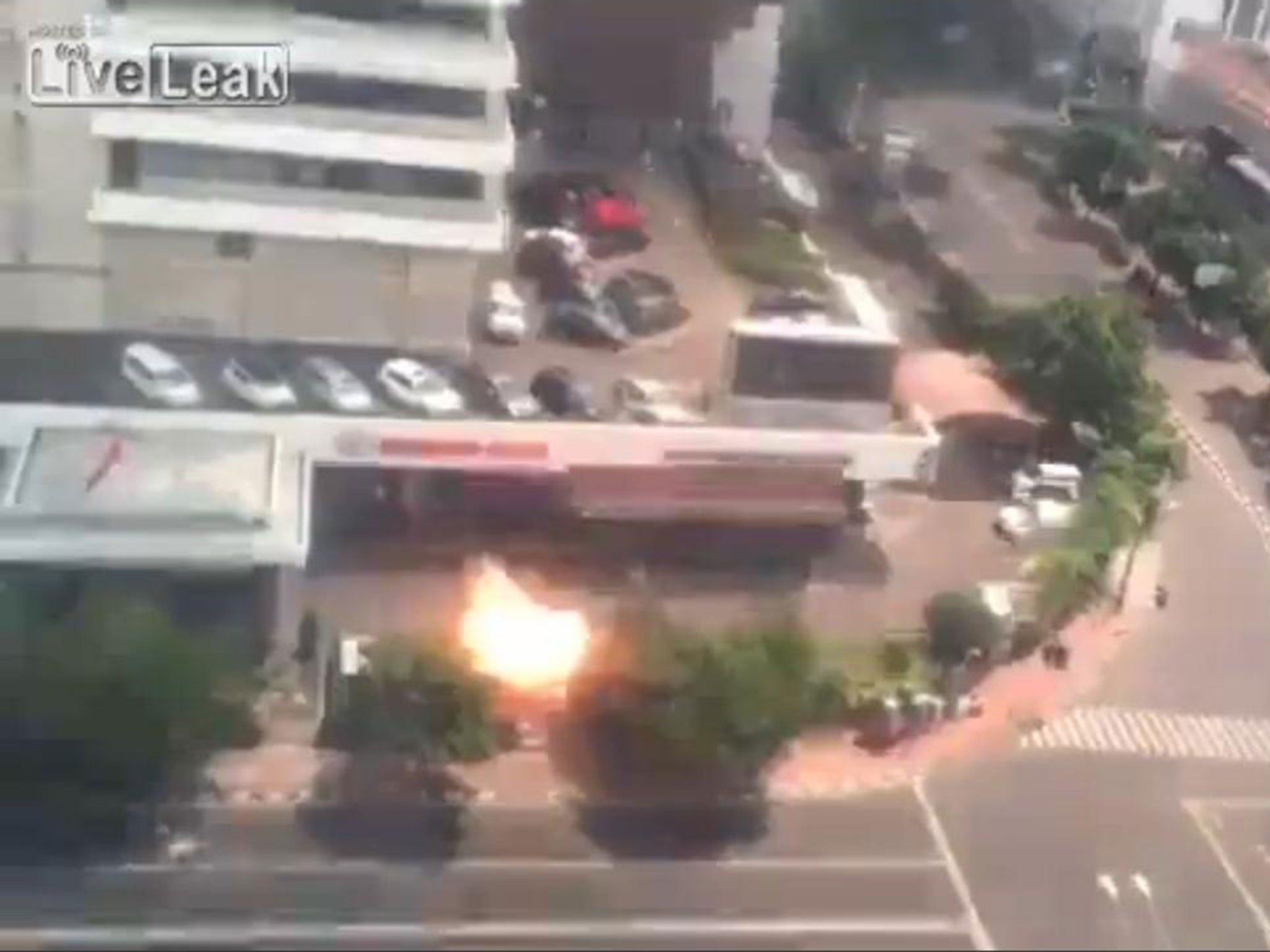 Office workers in a nearby building filmed the gunfight and explosions at the Sarinah shopping centre on Thursday.