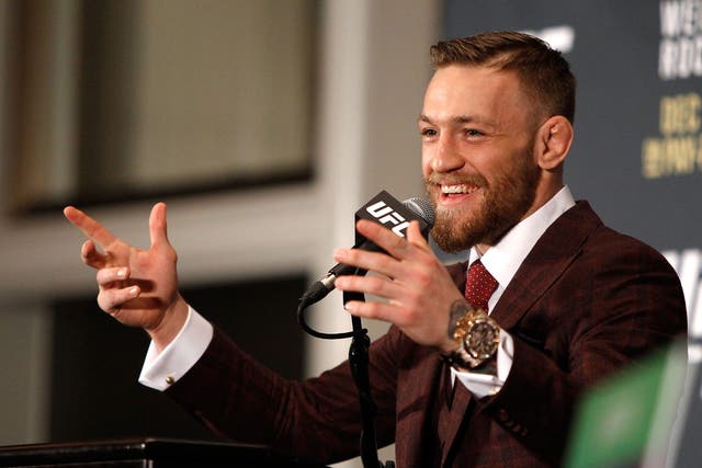Conor McGregor will bid to hold two belts at once when he fights Rafael dos Anjos for the lightweight title