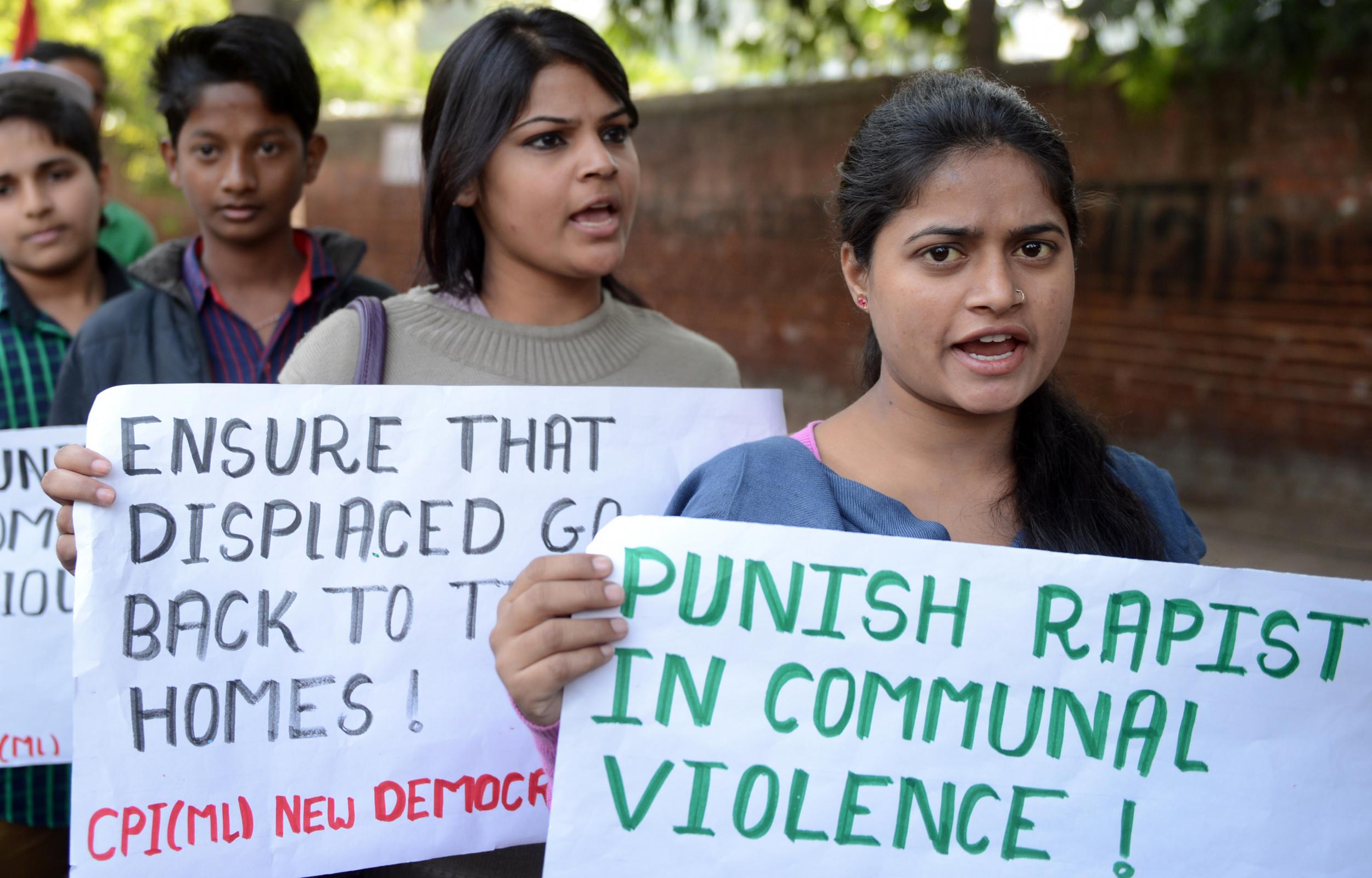 Demonstrators protest sexual assault in the Indian state of Uttar Pradesh
