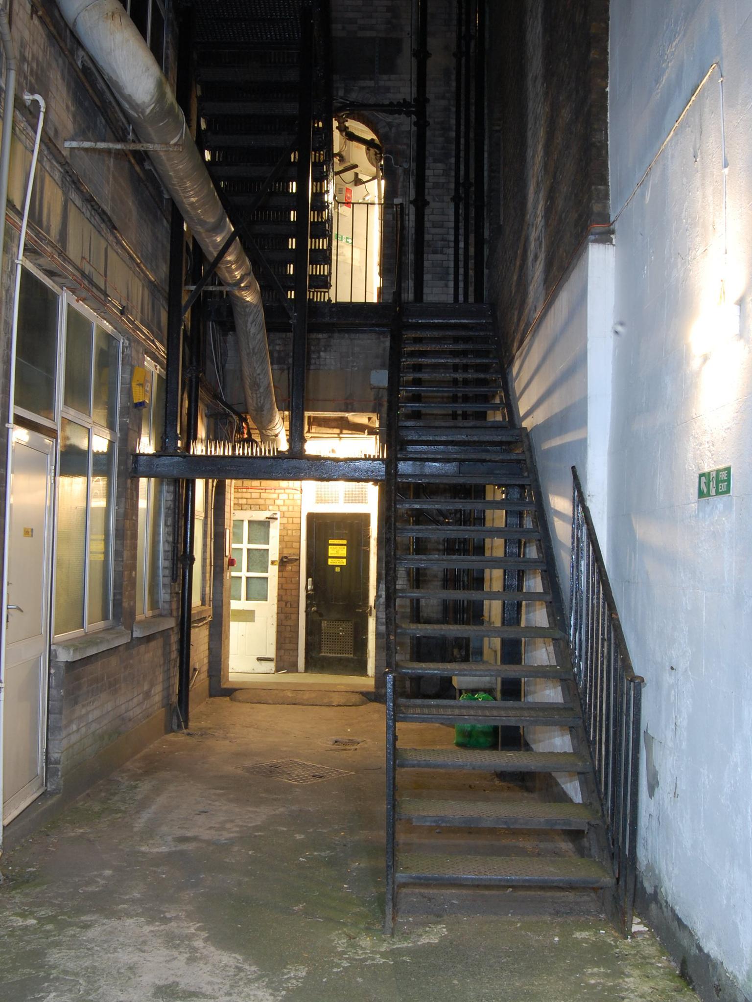 Staircase from the courtyard up to the fire exit, onto Greville Street