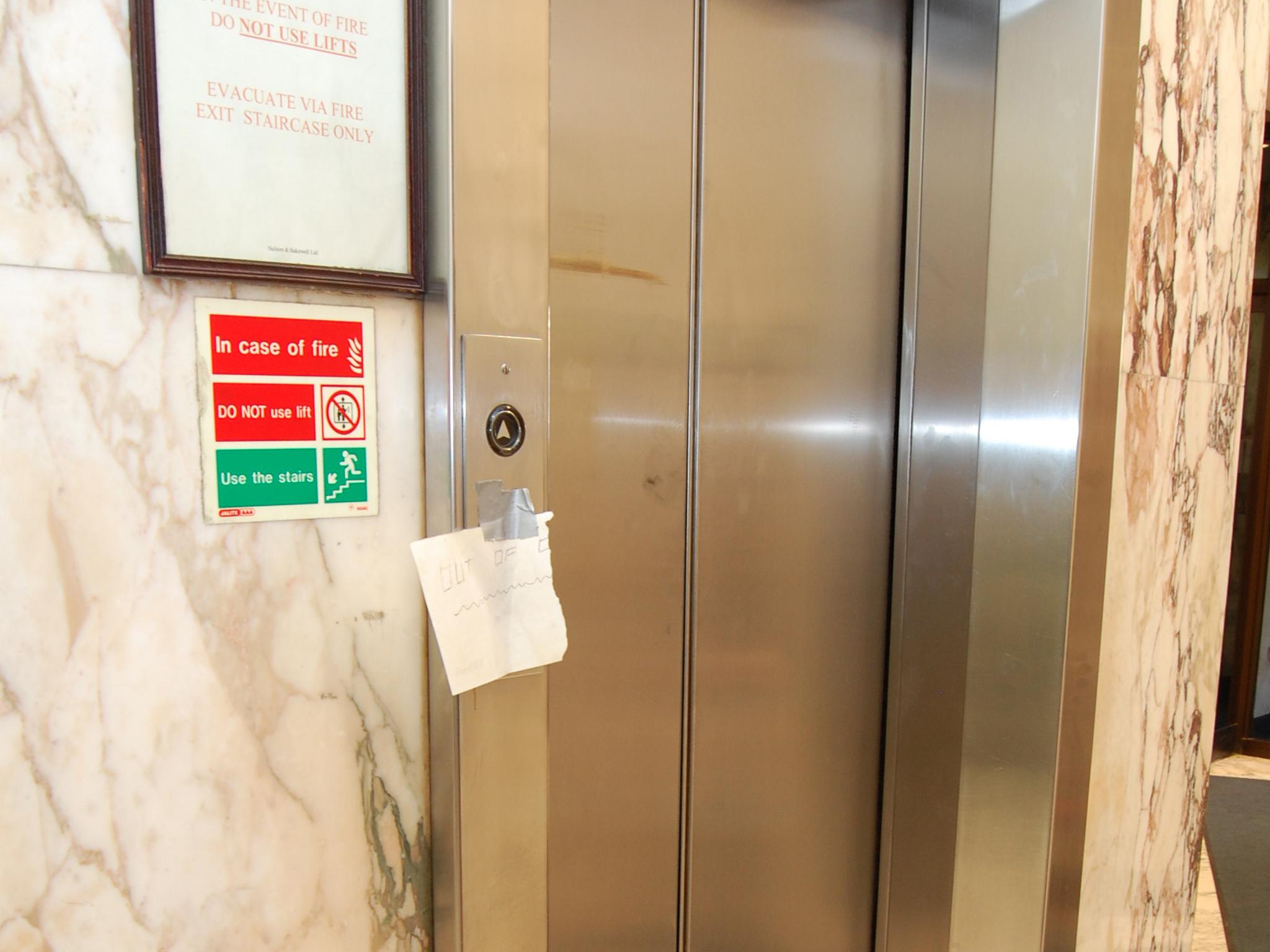 Lift (ground floor) with out of order sign