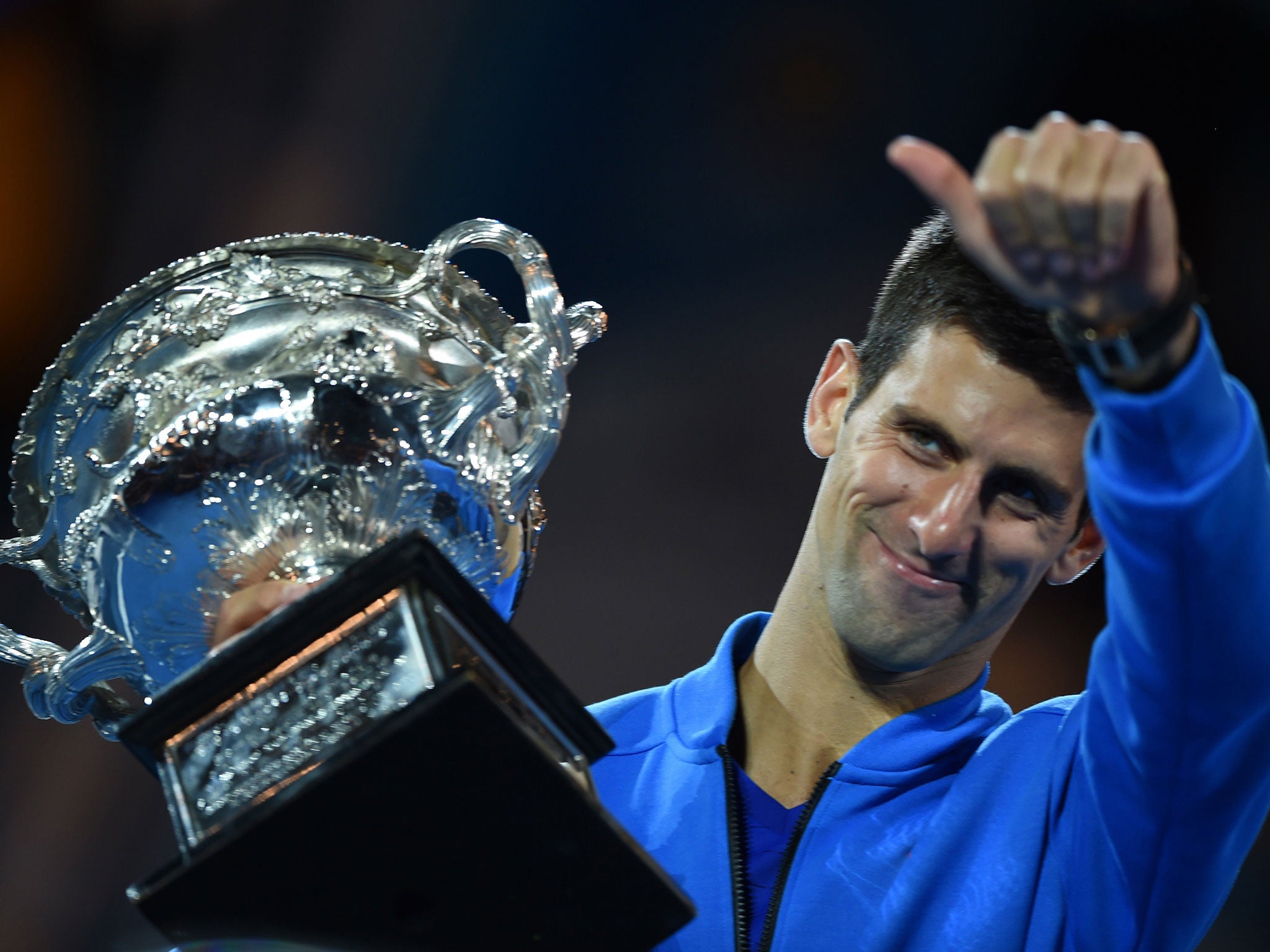 Novak Djokovic celebrates after winning the 2015 Australian Open