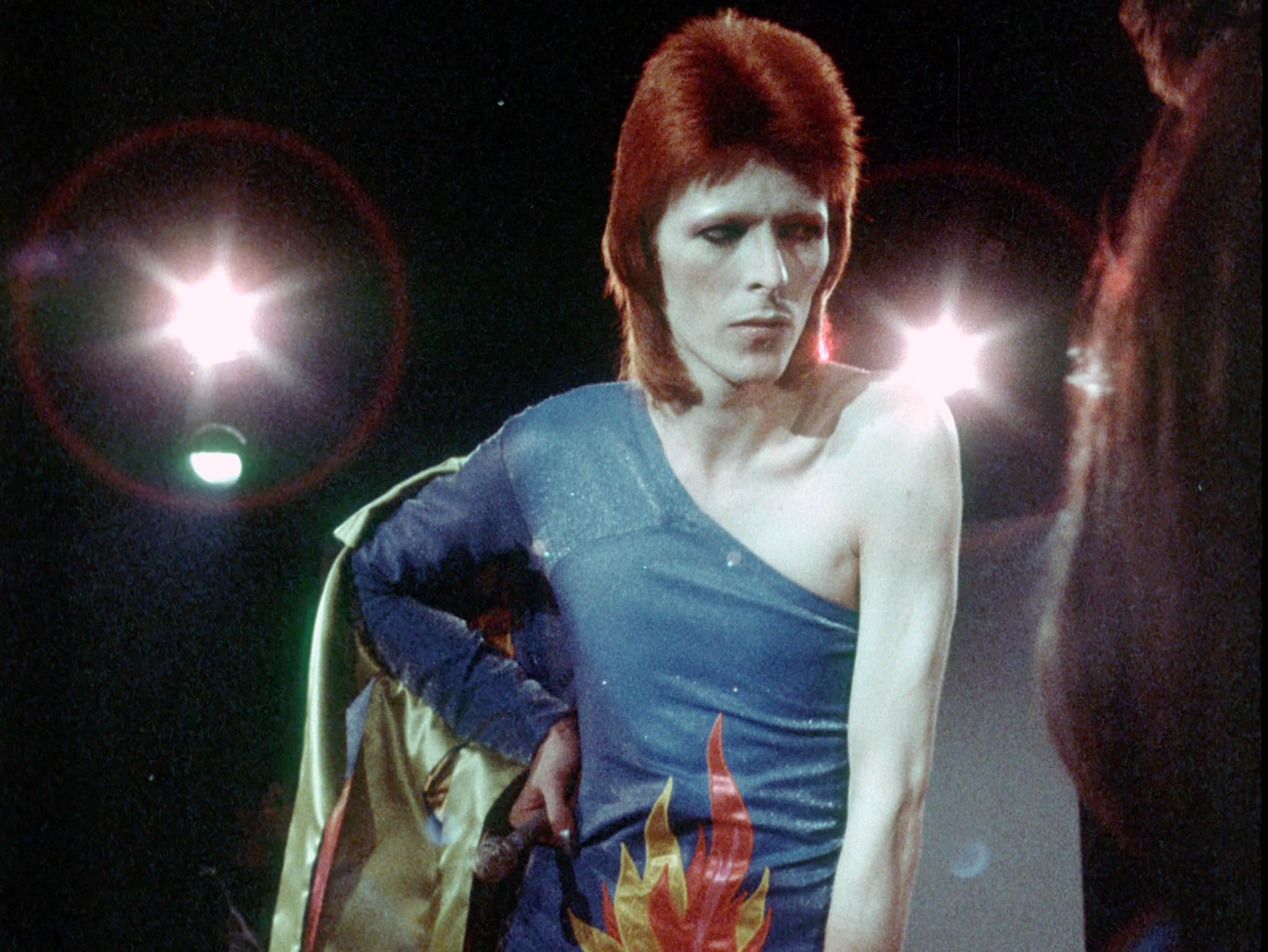 David Bowie performs onstage during his "Ziggy Stardust" era in 1973 in Los Angeles, California