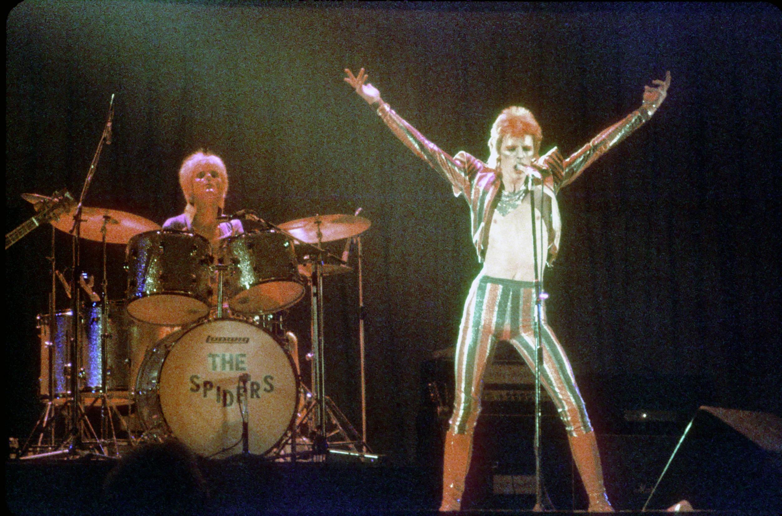 David Bowie performs onstage during his Ziggy Stardust era in 1973 in Los Angeles