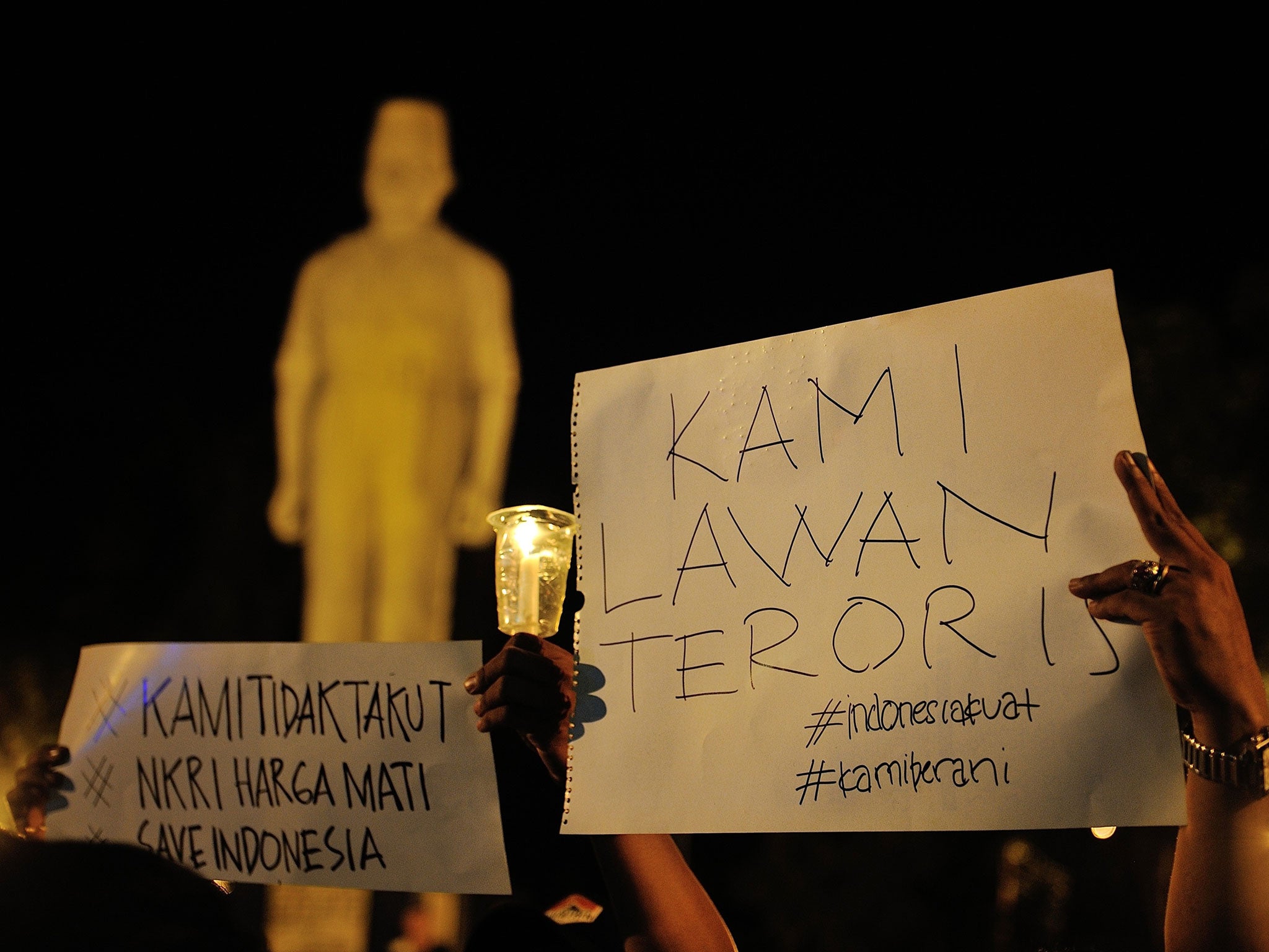 Indonesians protest against terrorism following the attacks in Jakarta on 14 January.