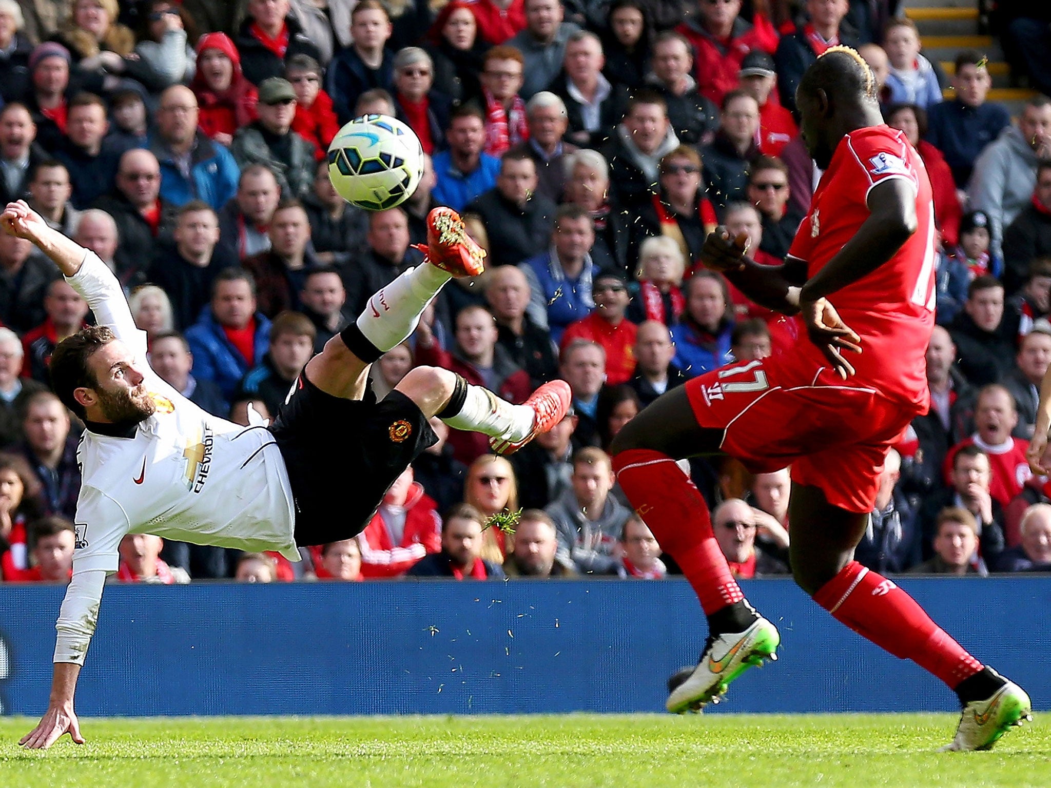 Juan Mata scores against Liverpool during Manchester United's 3-0 win in March 2015