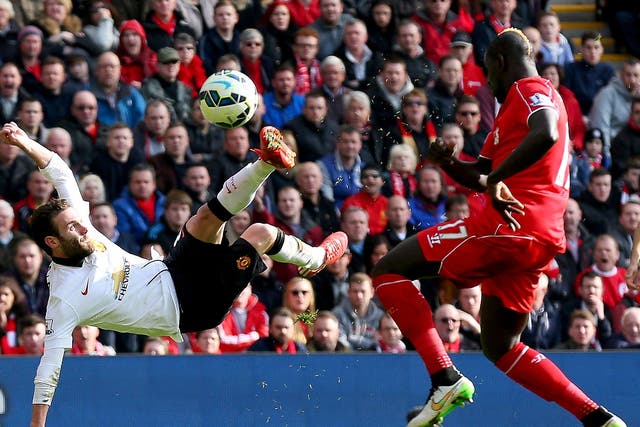 Juan Mata scores against Liverpool during Manchester United's 3-0 win in March 2015