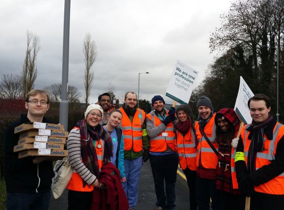 Pizza is donated to doctors at a picket line outside Airedale Hospital, Yorkshire
