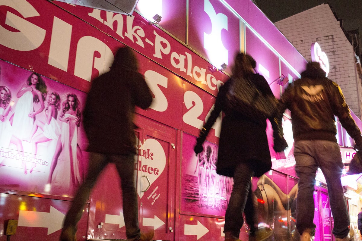 Prostitutes should be free to work without fear of arrest in 'managed ...
