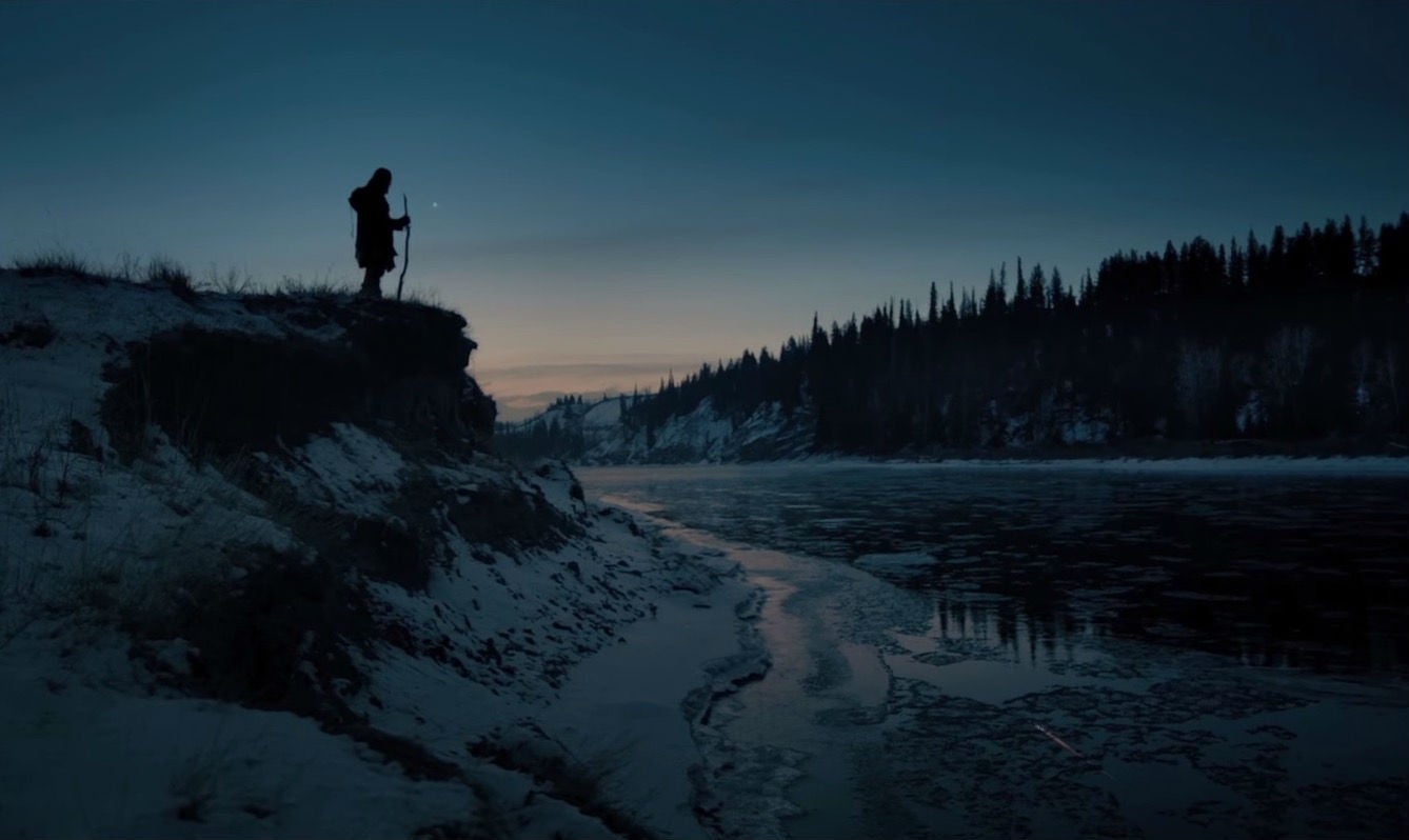 Leonardo DiCaprio stands atop a mountain in front of Emmanuel Lubezki's camera in The Revenant