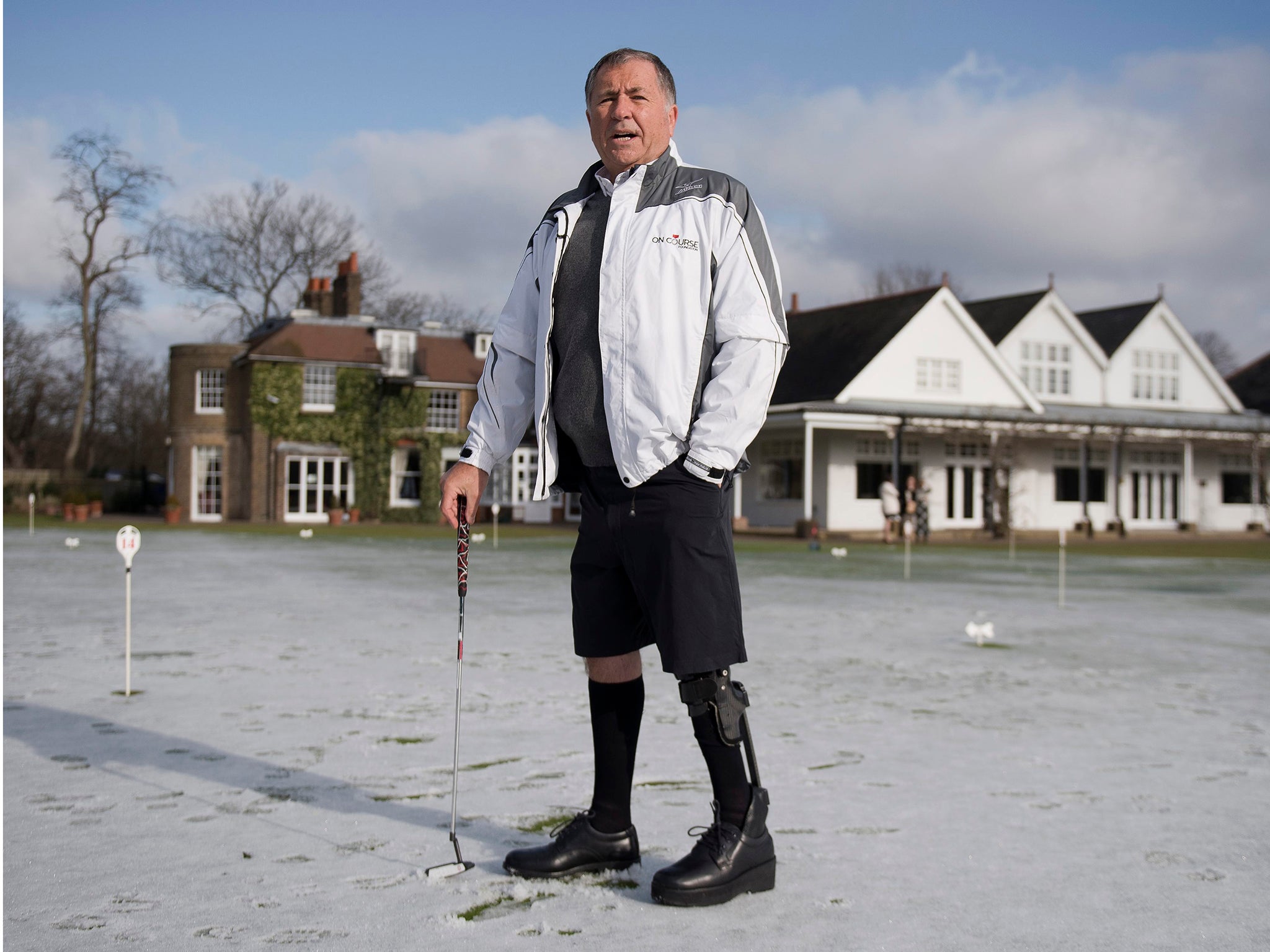John Simpson wears the world's first lower-limb bionic exo-skeleton, at Royal Wimbledon Golf Course, London, Britain,
