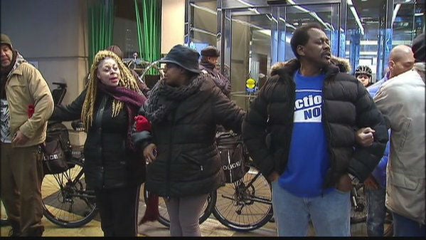 Protestors gather at the Martin Luther King breakfast and call for the Mayor to step down