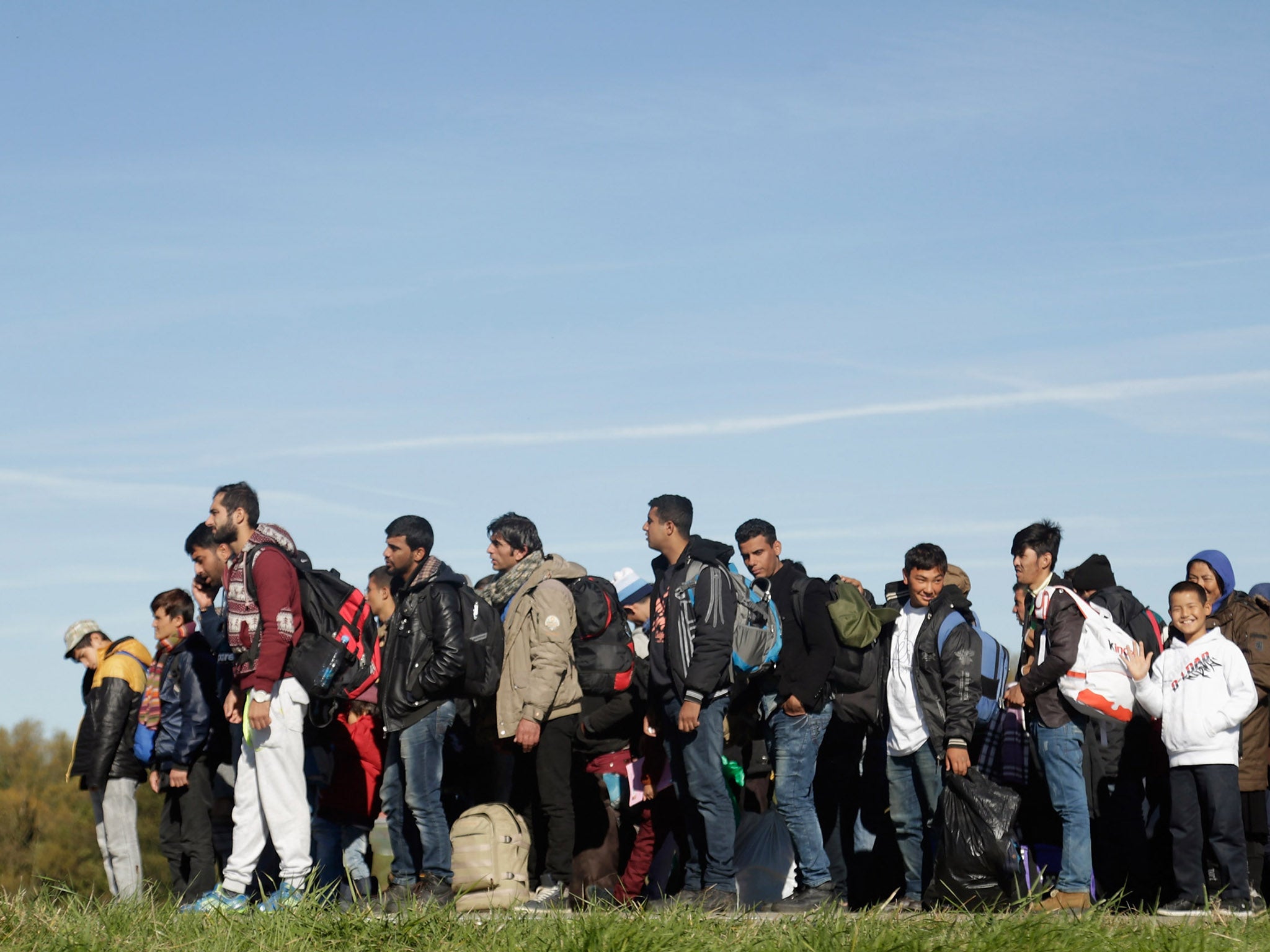 Migrants arrive at the German border to Austria