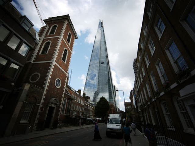 The Shard towers over St Thomas Street In London