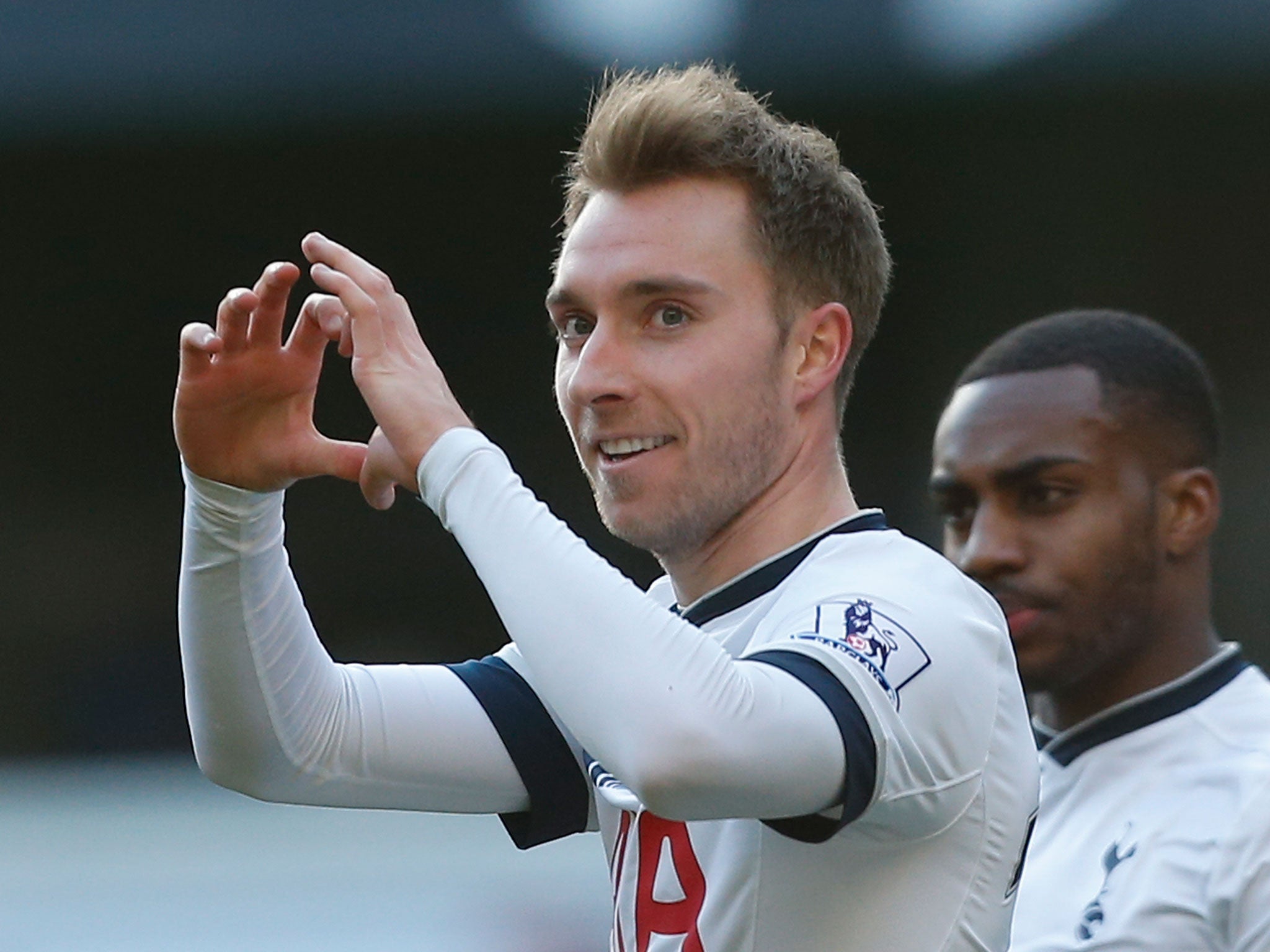 Christian Eriksen celebrates scoring against Sunderland