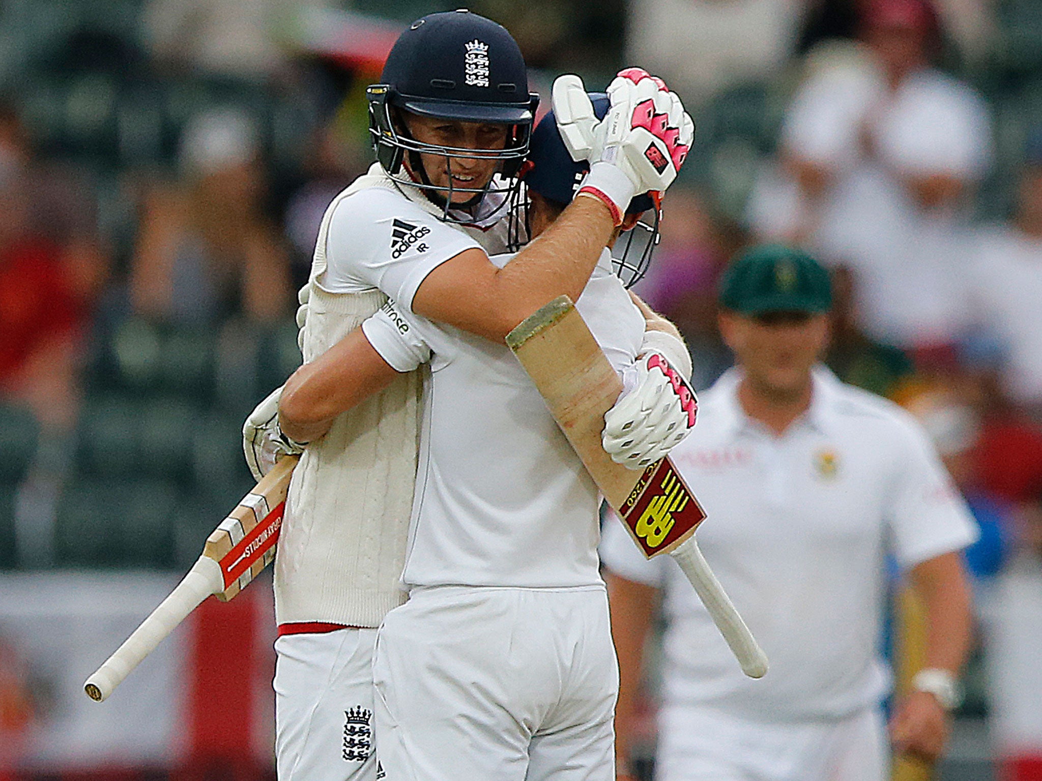 Joe Root and James Taylor celebrate the third Test victory over South Africa