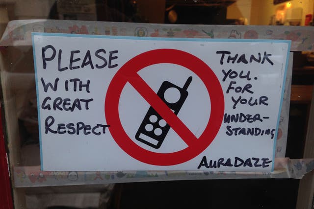 The sign on the door of the restaurant