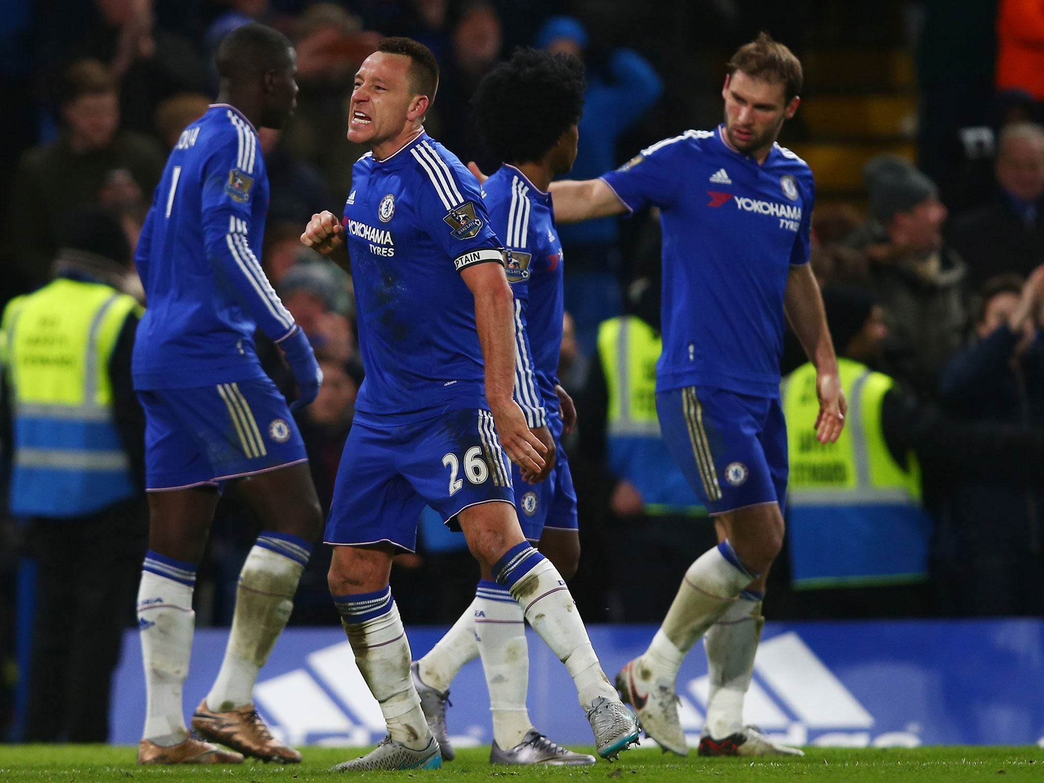 John Terry celebrates scoring a 98th-minute equaliser in the 3-3 draw between Chelsea and Everton