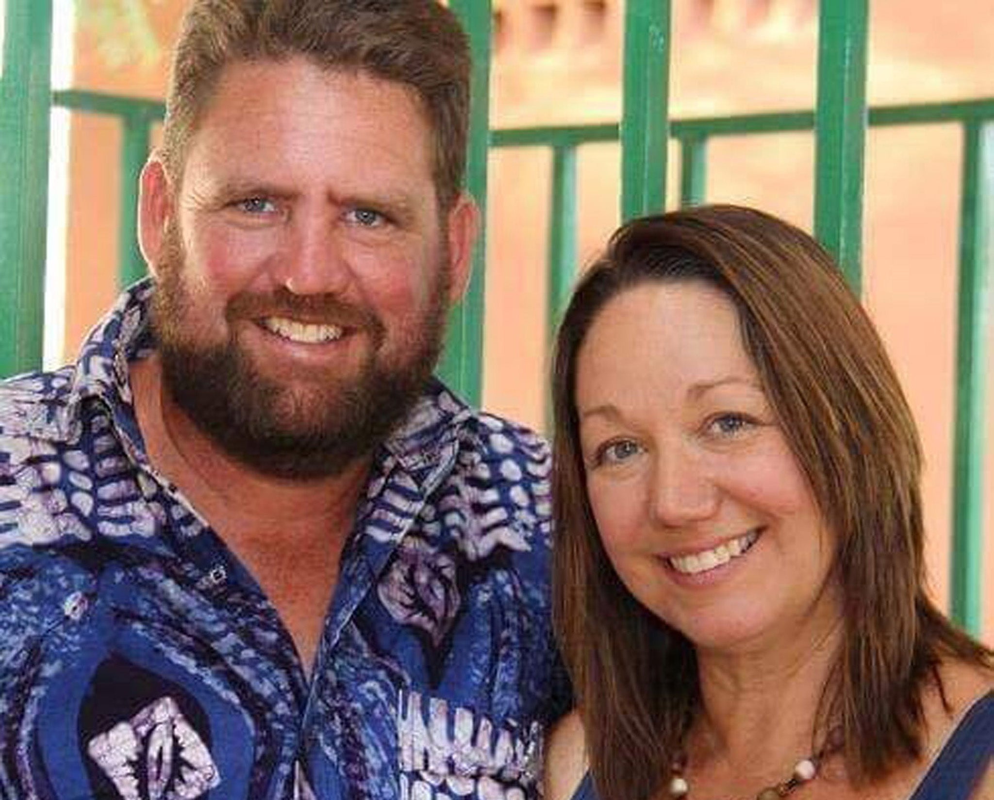 Michael Riddering, 45, (pictured with his wife Amy Riddering-Boyle) was killed at the Cappuccino Cafe during the Islamist siege in Ouagadougou, Burkina Faso