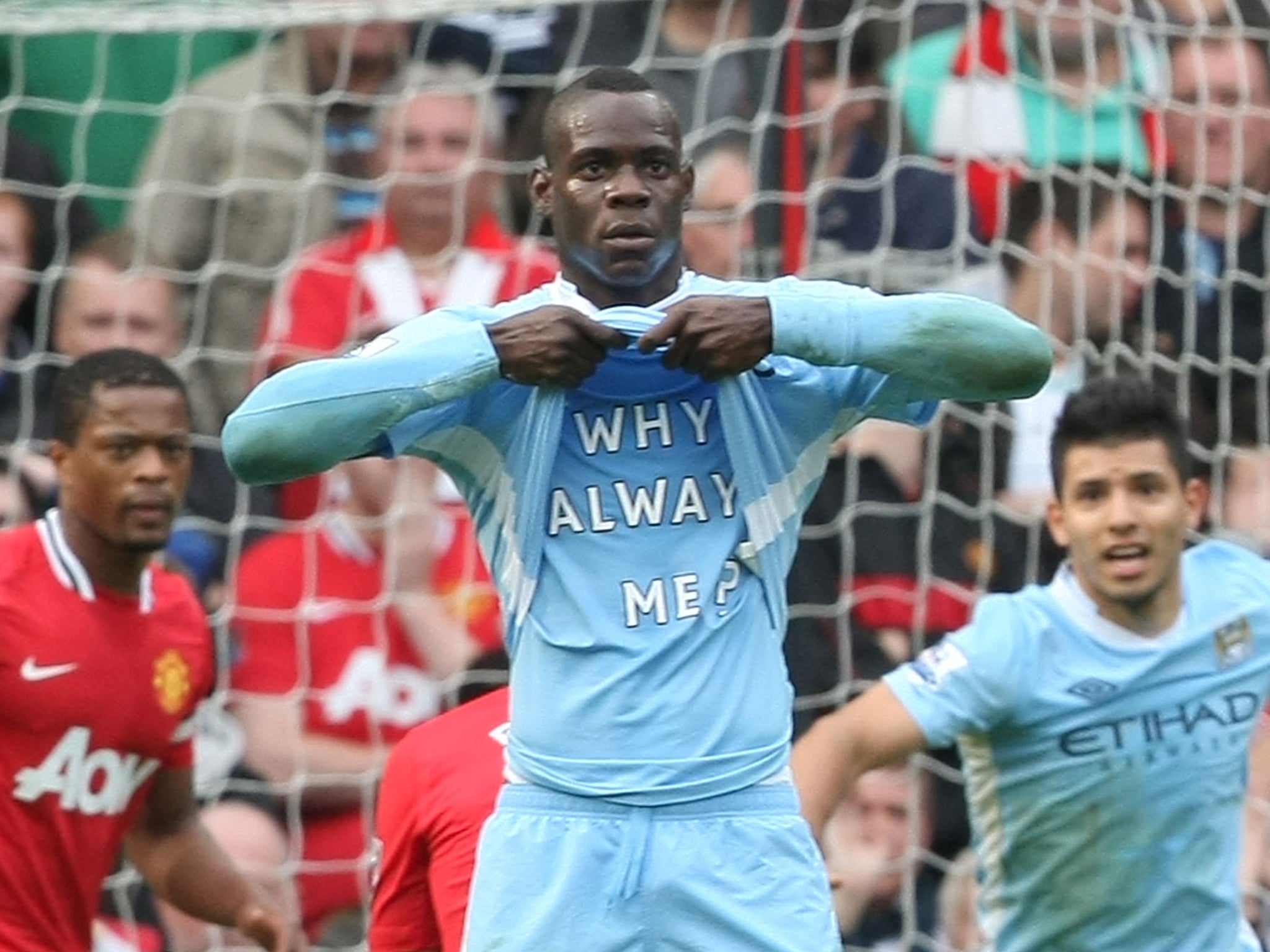 Mario Balotelli unveils his now infamous T-shirt against United back in 2011