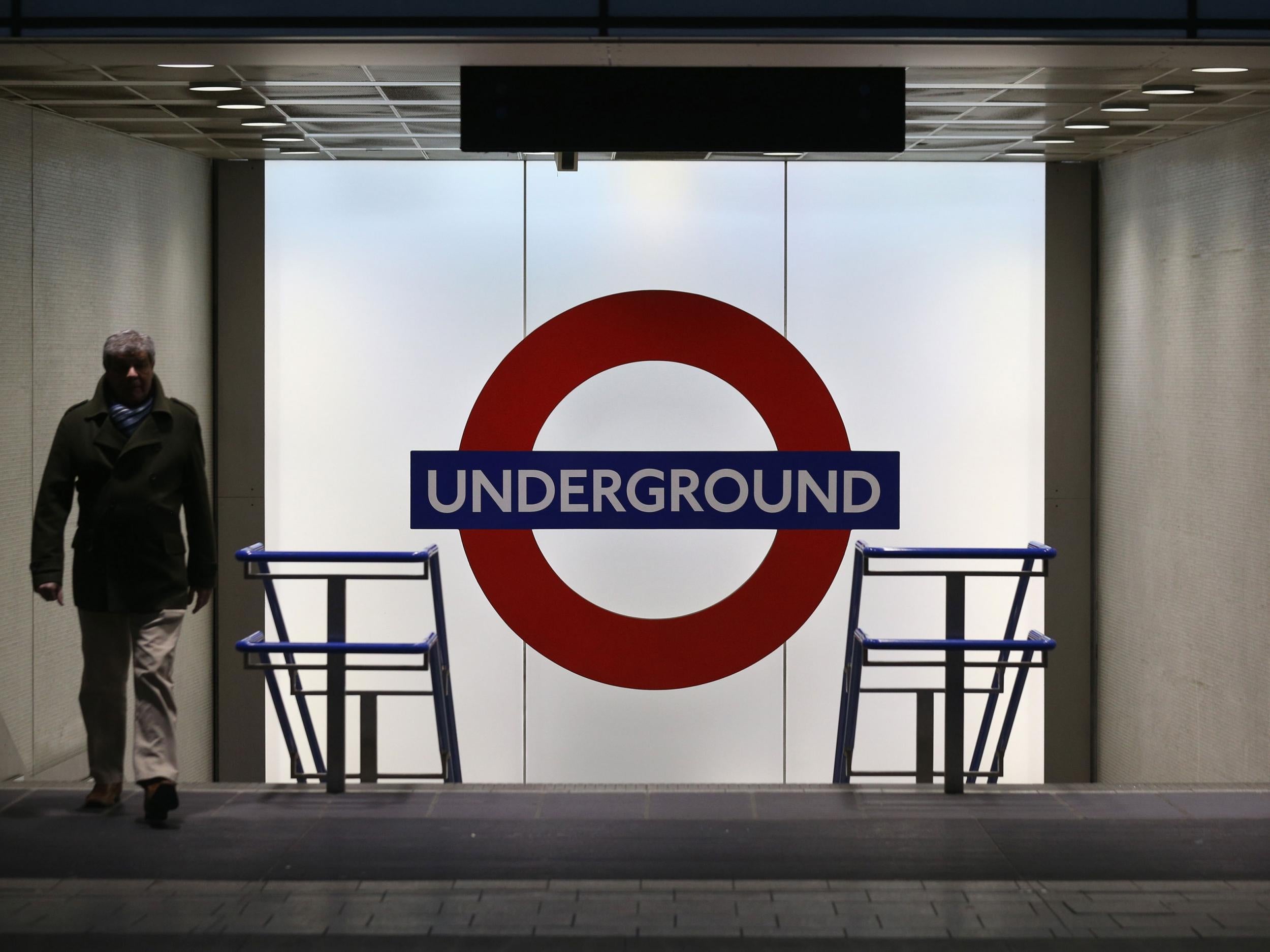Members of the public use the London Underground in Kings Cross Station
