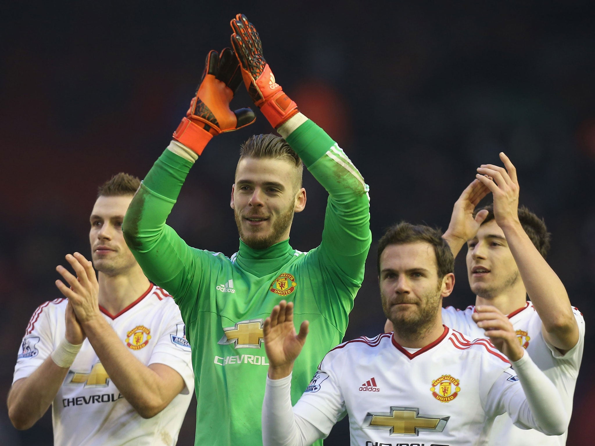 David De Gea celebrates with his Manchester United team-mates after a 1-0 win over Liverpool
