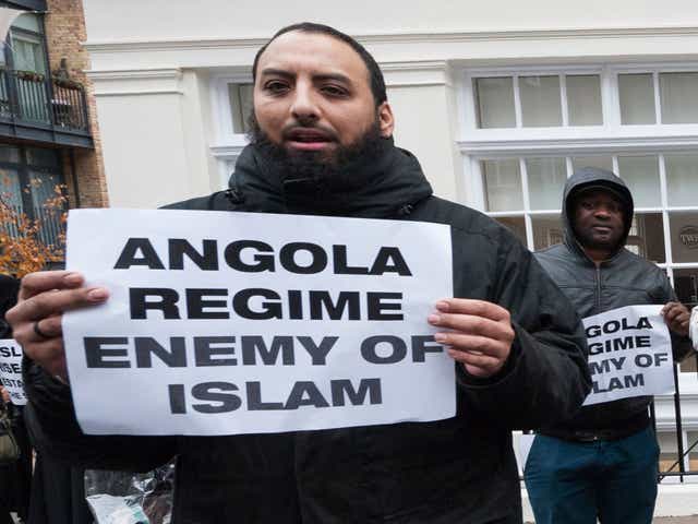 Mohammed Reza Haque protests outside the Angolan embassy in London in 2013
