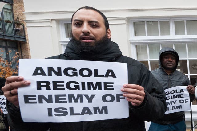 Mohammed Reza Haque protests outside the Angolan embassy in London in 2013