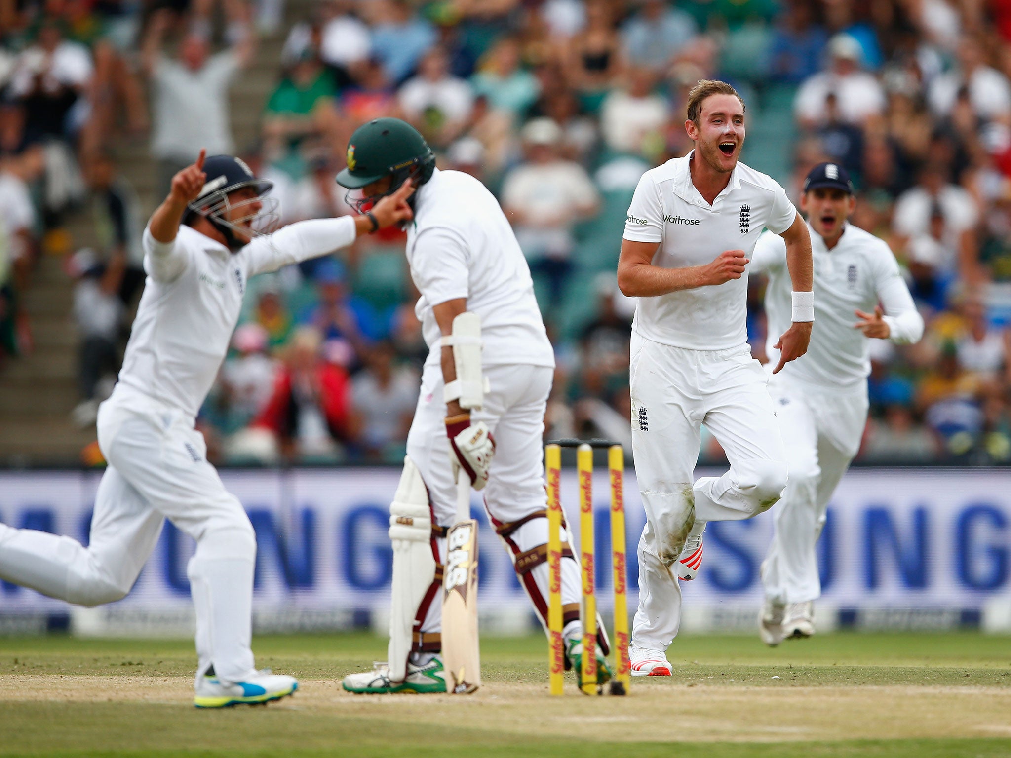 A joyous Stuart Broad of England celebrates taking the wicket of Hashim Amla thanks to a wonderful catch by James Taylor