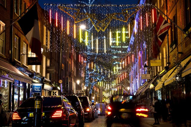 Christmas lights are displayed near Covent Garden in central London