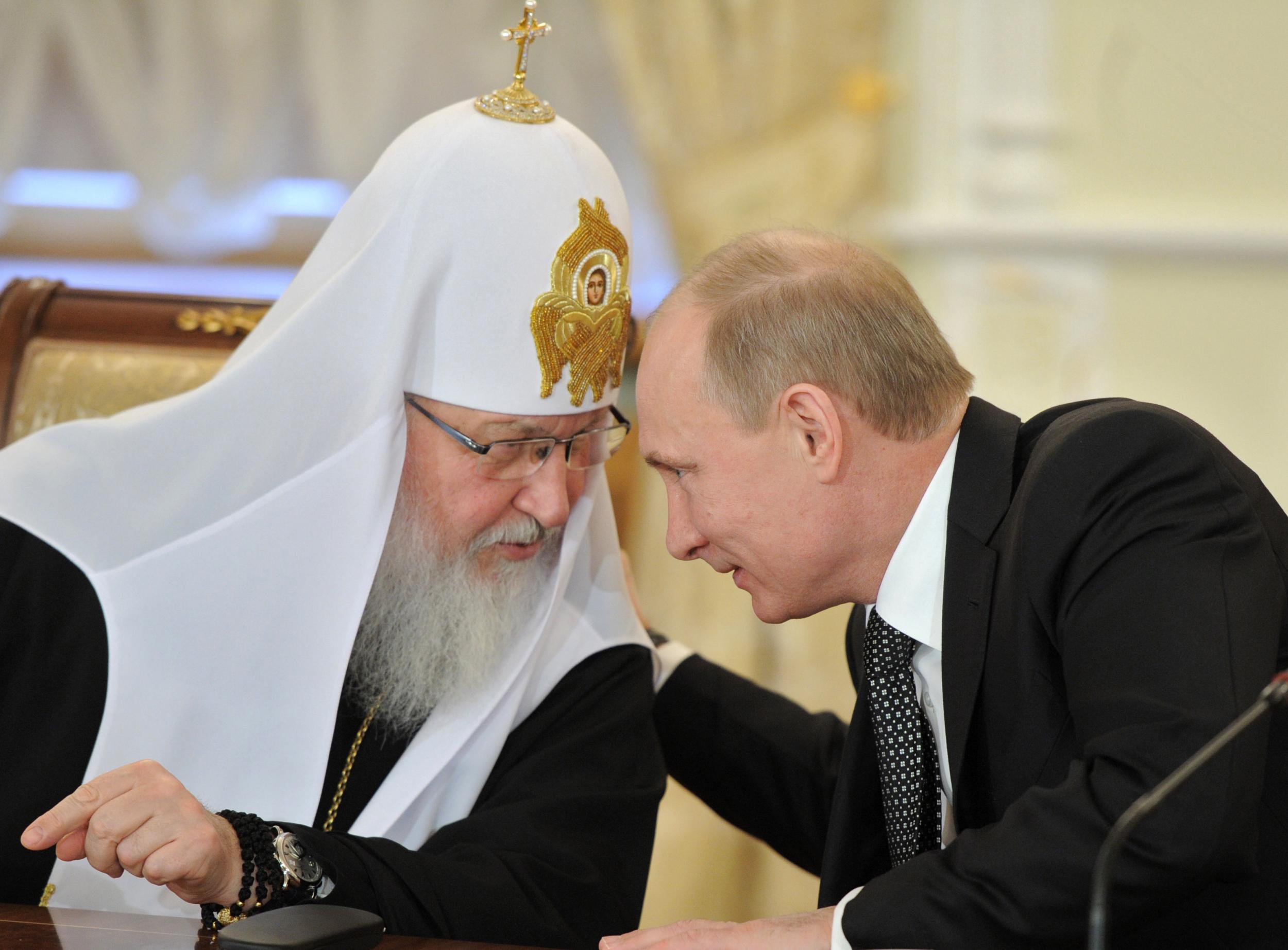 Patriarch Kirill, pictured with Russian President Vladimir Putin, claimed he was not surprised that 'honest' Muslims are flocking to Isis' quasi-religious state
