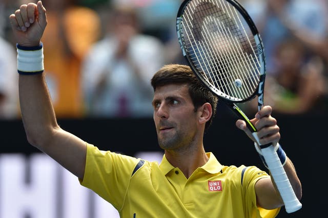 Novak Djokovic celebrates his Australian Open first round victory over Chung Hyeon