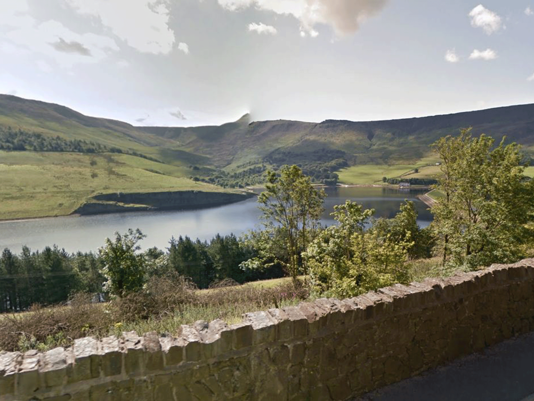Dovestone Reservoir outside Manchester, with the track in the background into the mountains where the man was found