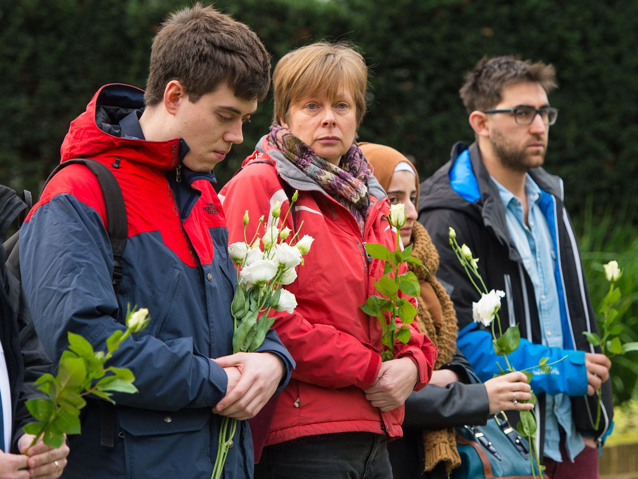 Campaigners at a memorial service organised by Citizens UK for refugees who have died trying to reach the UK, at St Andrew's Church in the City of London.