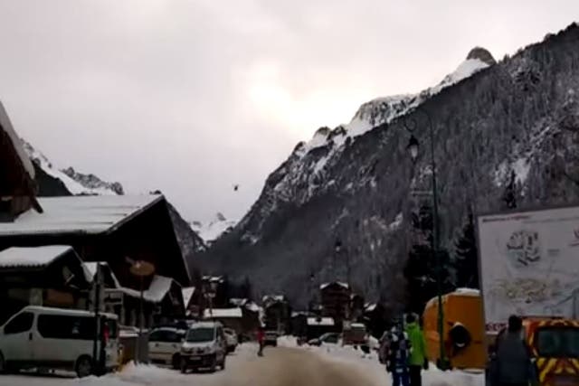 A helicopter flies off to join the rescue operation in Savoie in the French Alps where five soldiers were killed in an avalanche