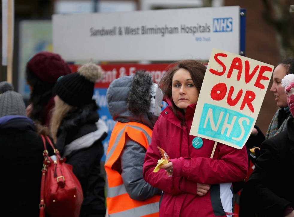 Junior doctors and their supporters picket outside Sandwell General Hospital in West Bromwich on Tuesday