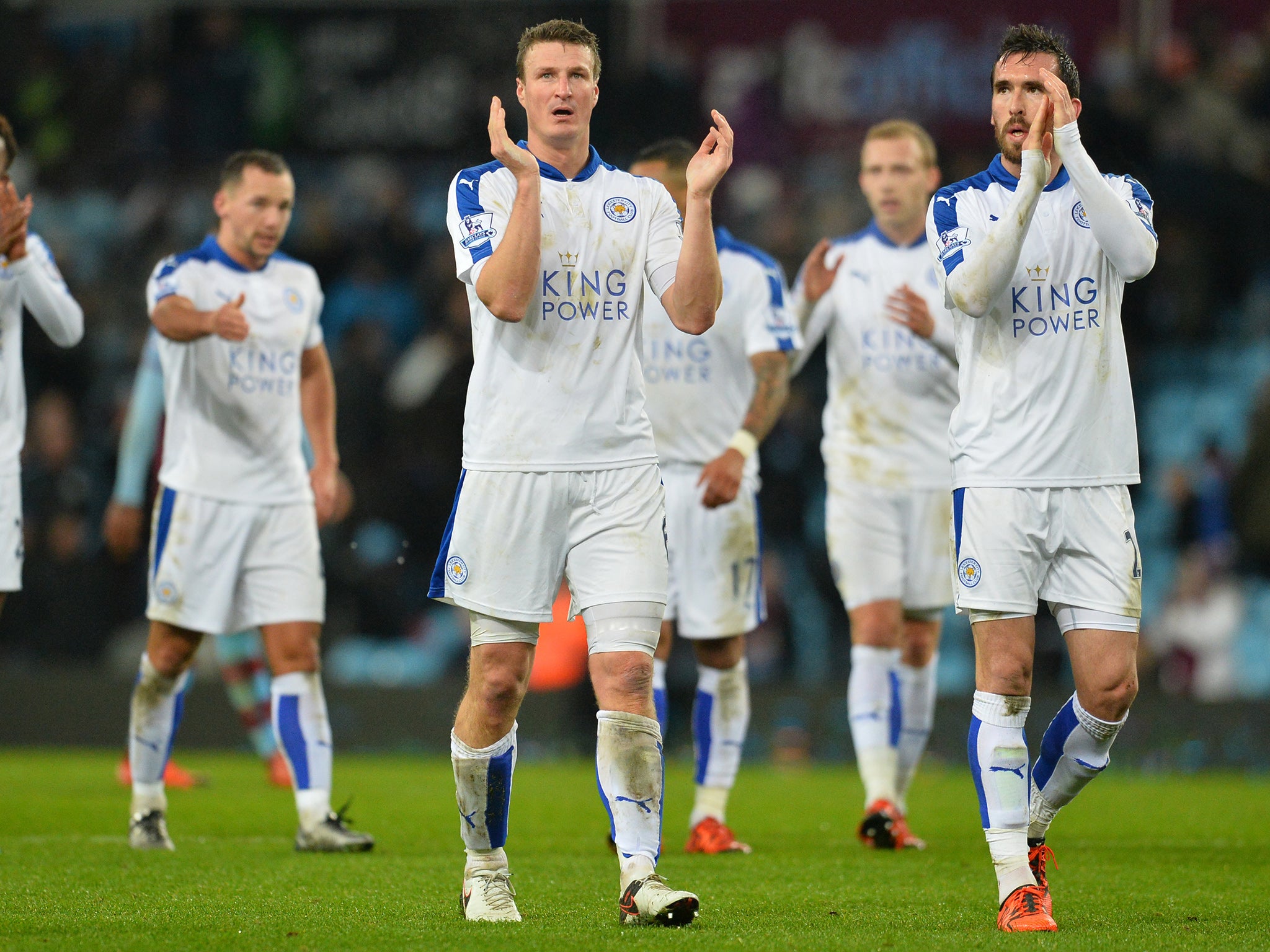 Leicester City walk off the field after their draw with Aston Villa