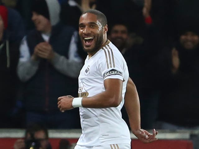 Ashley Williams celebrates opening the scoring for Swansea against Watford