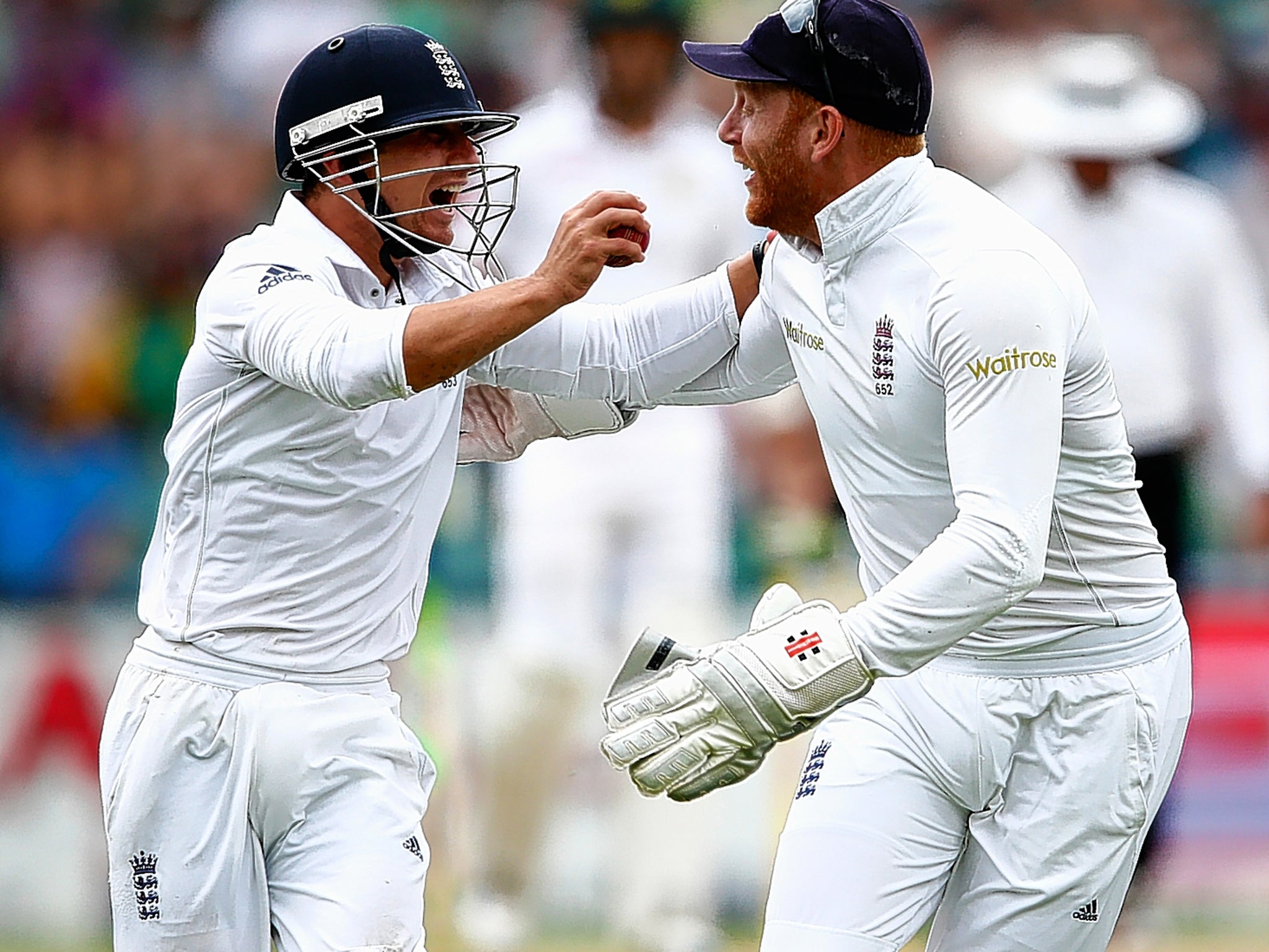 James Taylor (left) celebrates with Jonny Bairstow after he caught South African batsman Dane Vilas at short leg during the dramatic third day of the third Test at the Wanderers