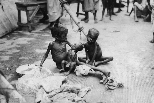 Starving children in India in 1945: academics have argued that some famines in the Raj were caused by British colonial policies