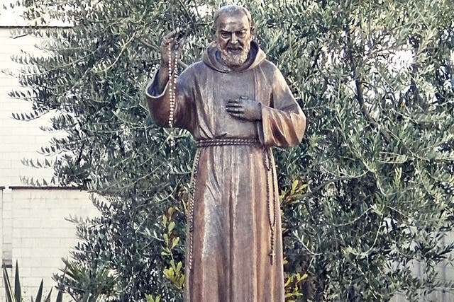 An existing sculpture of the Italian saint Padre Pio. The new shrine will only be slightly shorter than the  Statue of Liberty
