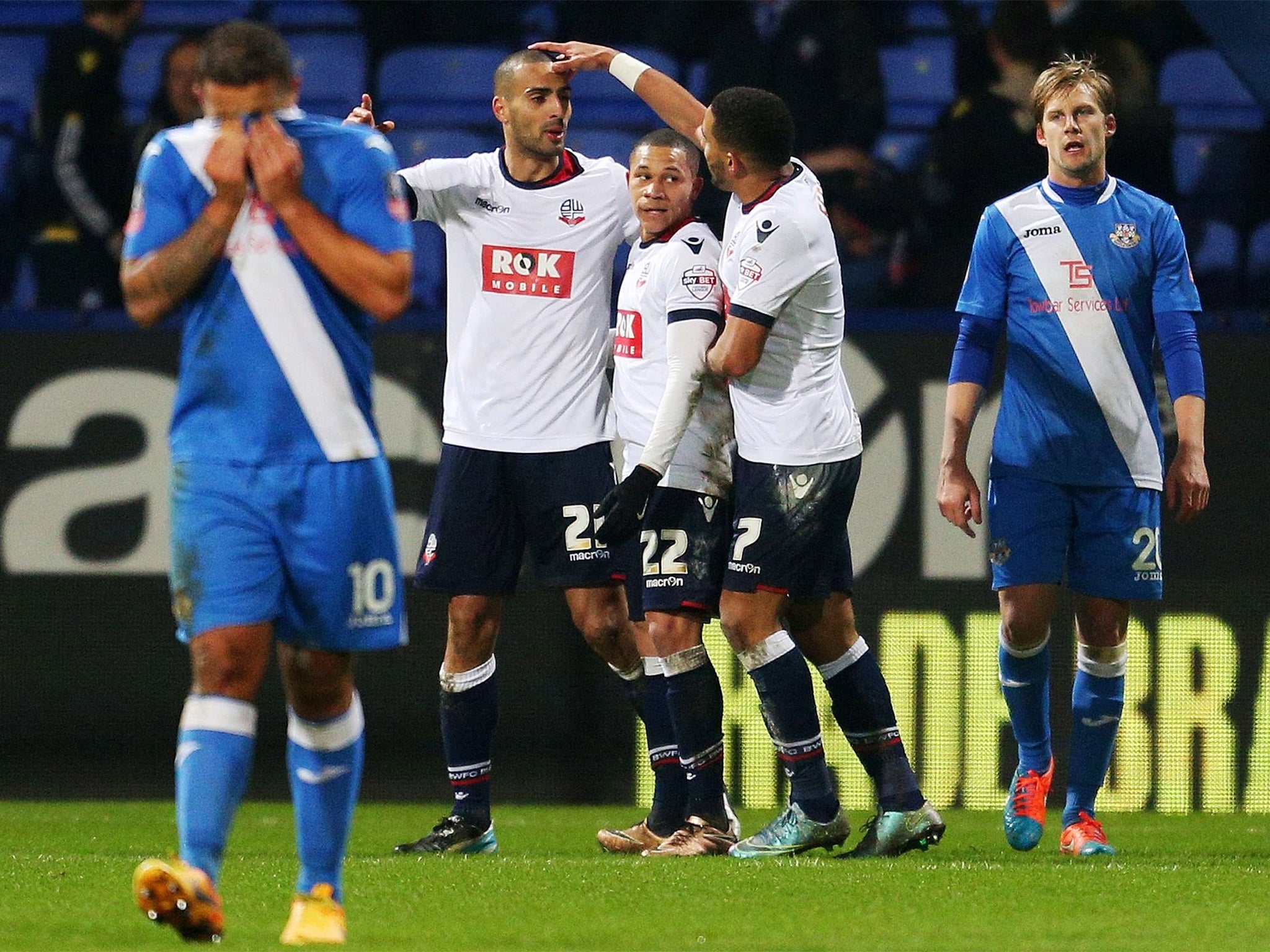 It is all too much for the Eastleigh players as Bolton’s Darren Pratley is congratulated after scoring the winner