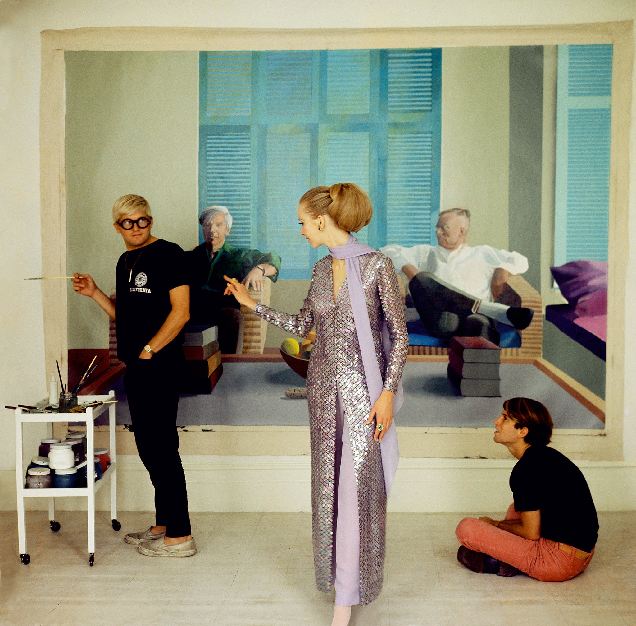 David Hockney with model Maudie James and photographer Peter Schlesinger in an image from the National Portrait Gallery’s forthcoming ‘Vogue 100: A Century of Style’ exhibition