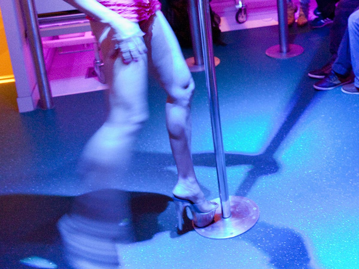 Spain bans police from strip club visits while on duty and in uniform | The  Independent | The Independent