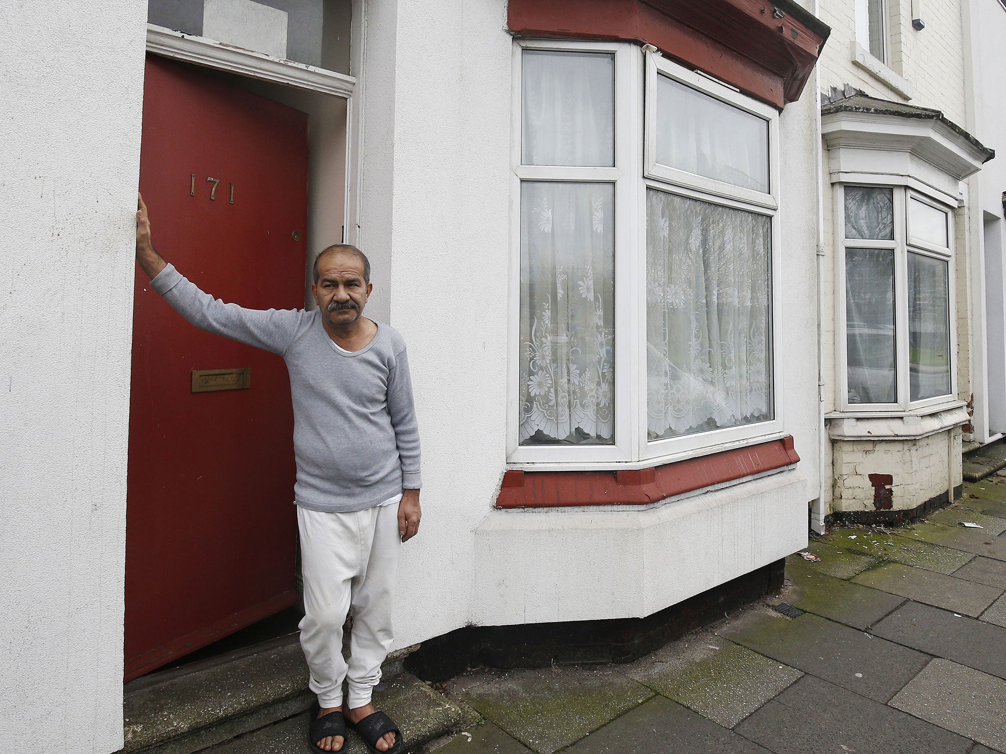 Mr Bayzavi's front door was painted red by Jomast, a subcontractor of services giant G4S