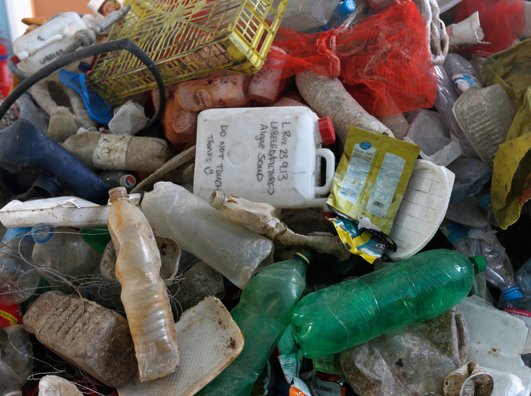 Plastic waste is seen at the plastic waste exhibition "Sea, The Last Leg" in down town Amman November 19, 2014