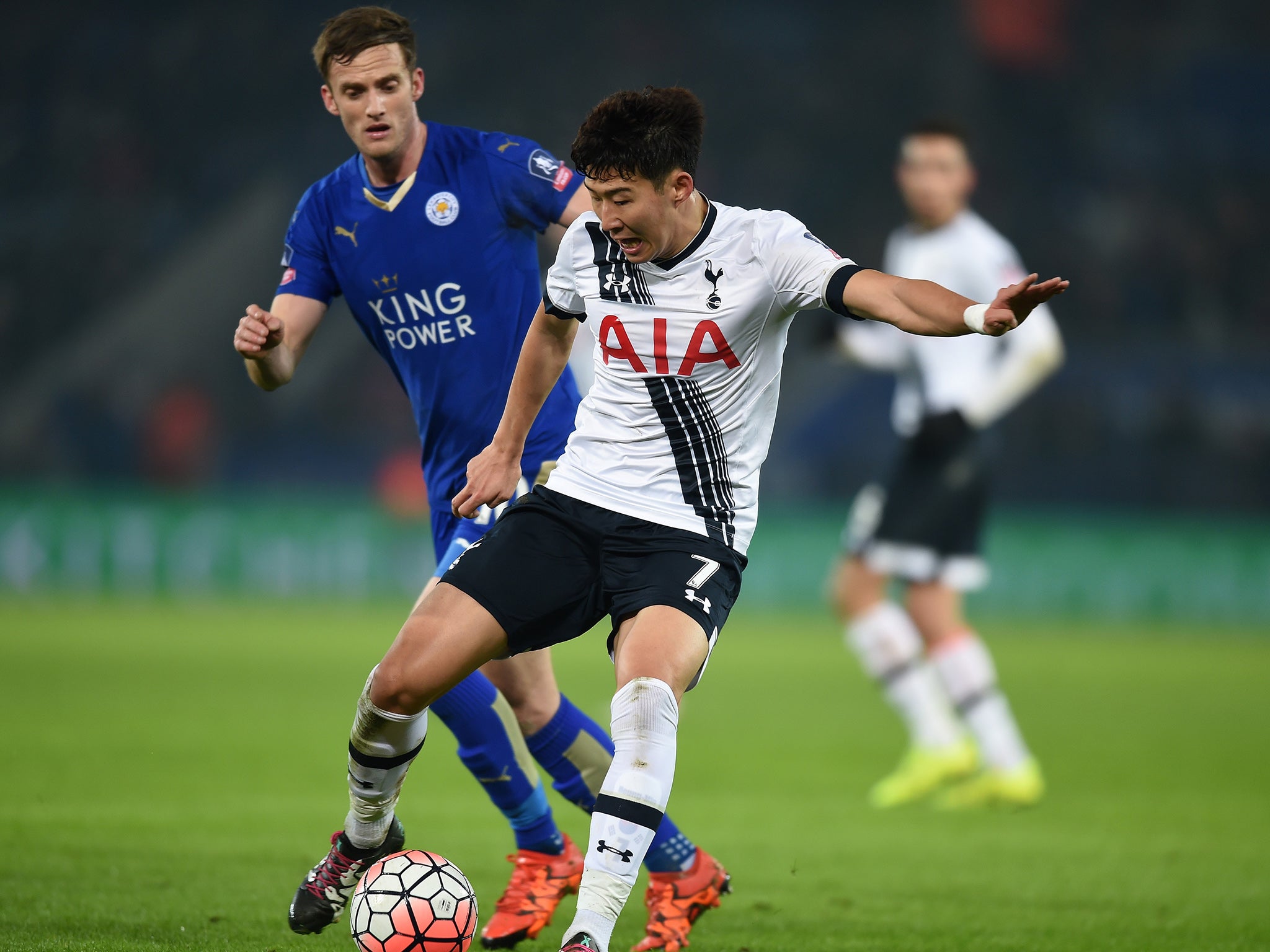 Son Heung-min competes with Andy King during the FA Cup third round replay