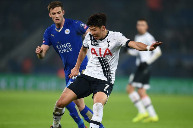 Son Heung-min competes with Andy King during the FA Cup third round replay