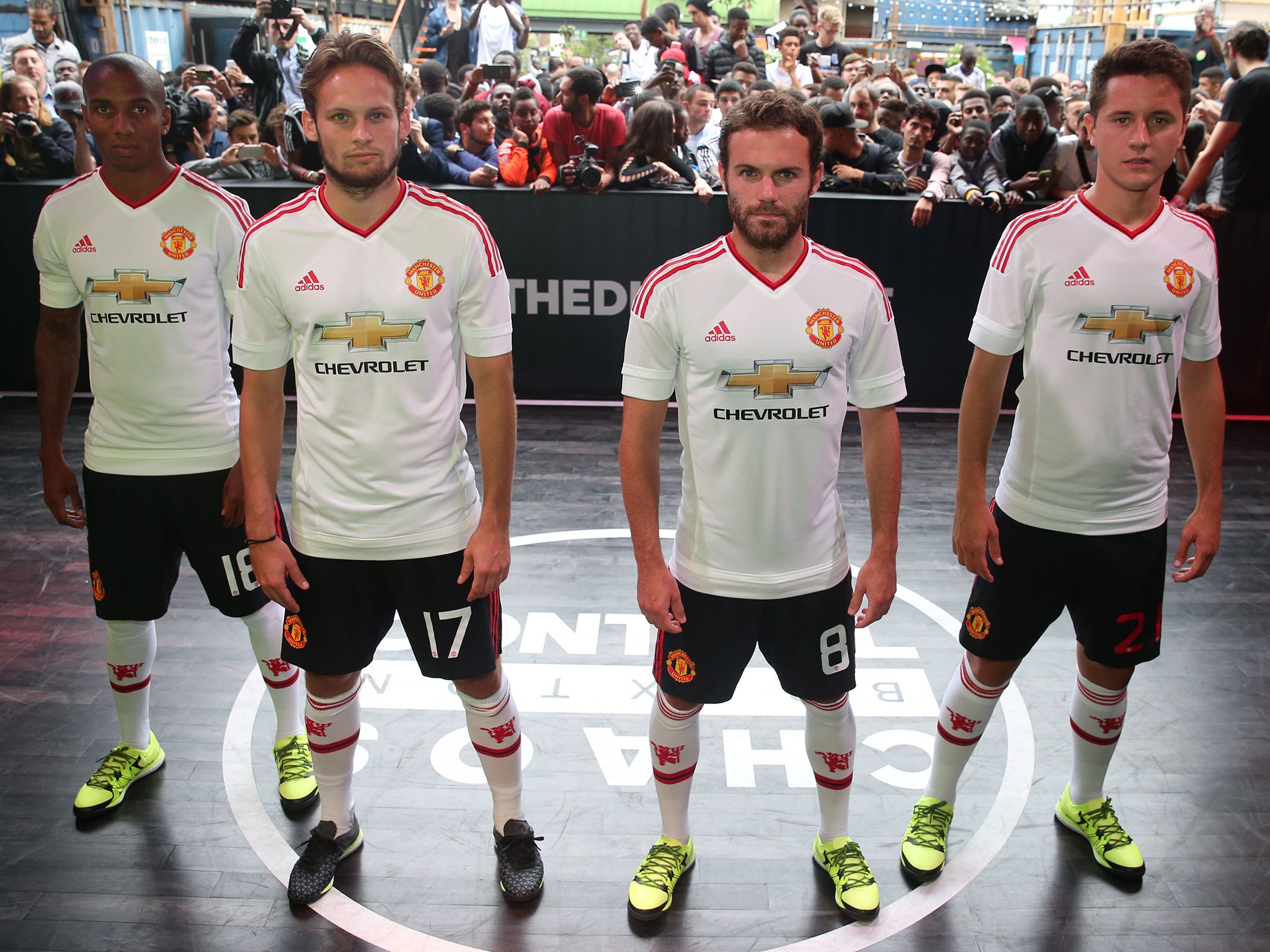 Ashley Young, Daley Blind, Juan Mata and Ander Herrera pose to promote Manchester United's Adidas away strip